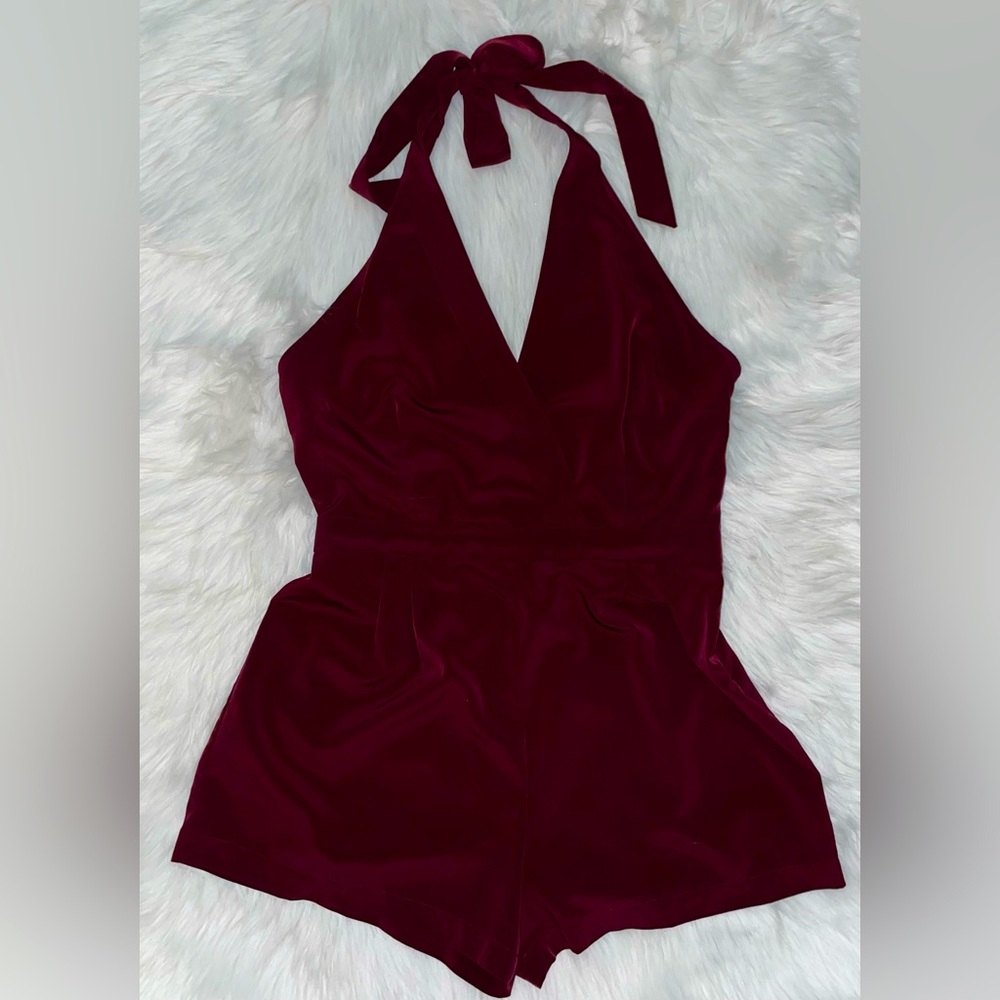 Size L V-Neck romper, ties around the neck zips on the size